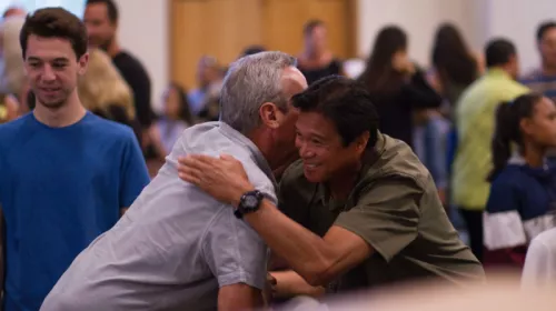 Men hugging