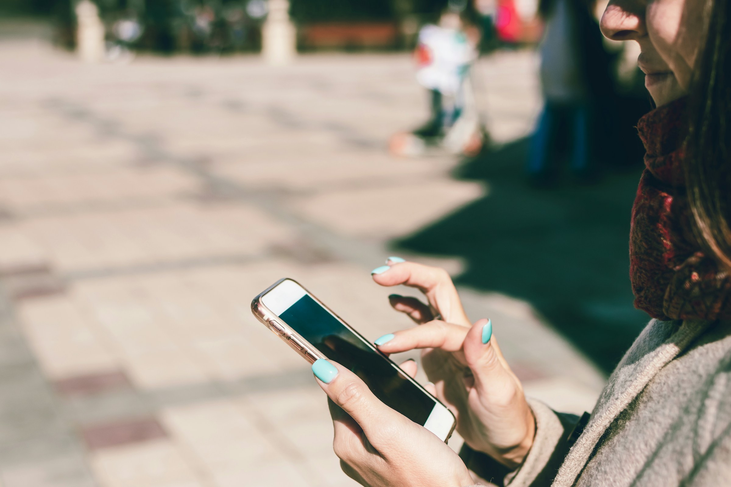 Woman scrolling on phone