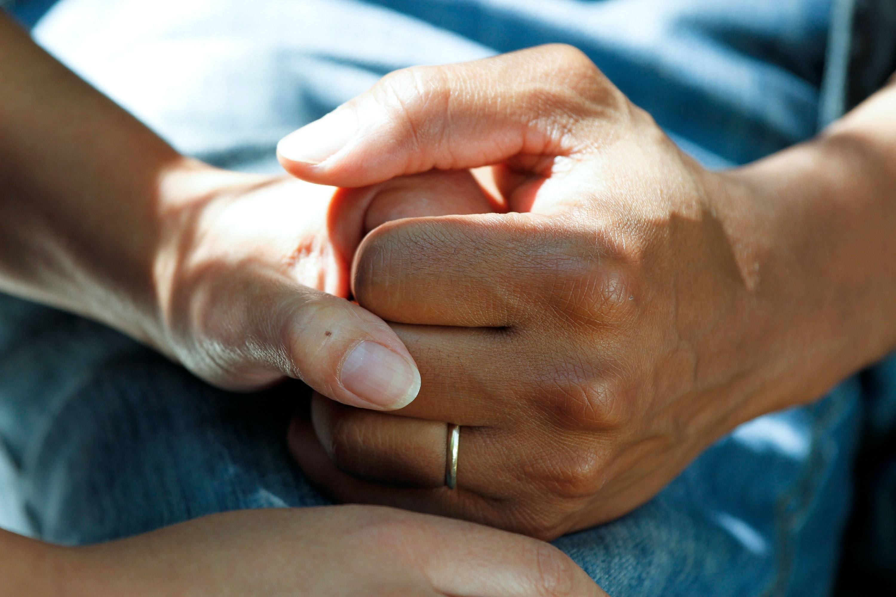 Caring hands holding