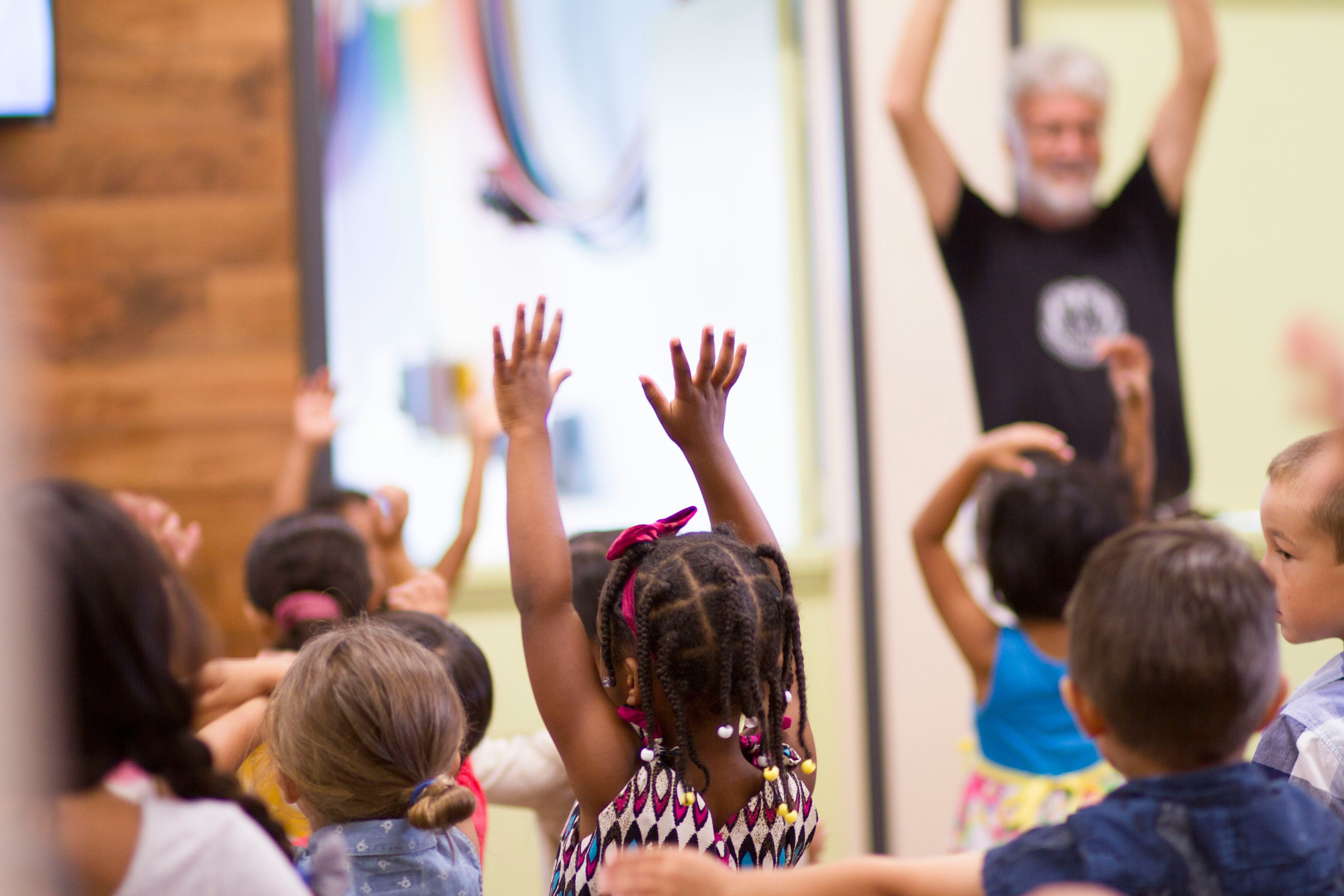 Children singing by erika giraud on unsplash