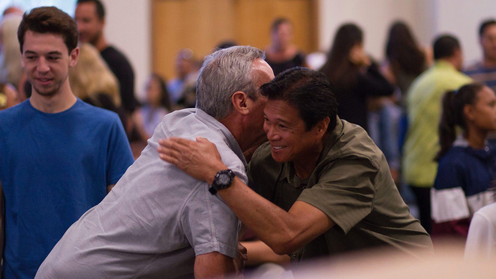 Men hugging