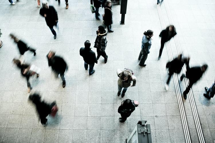 People walking in a train station
